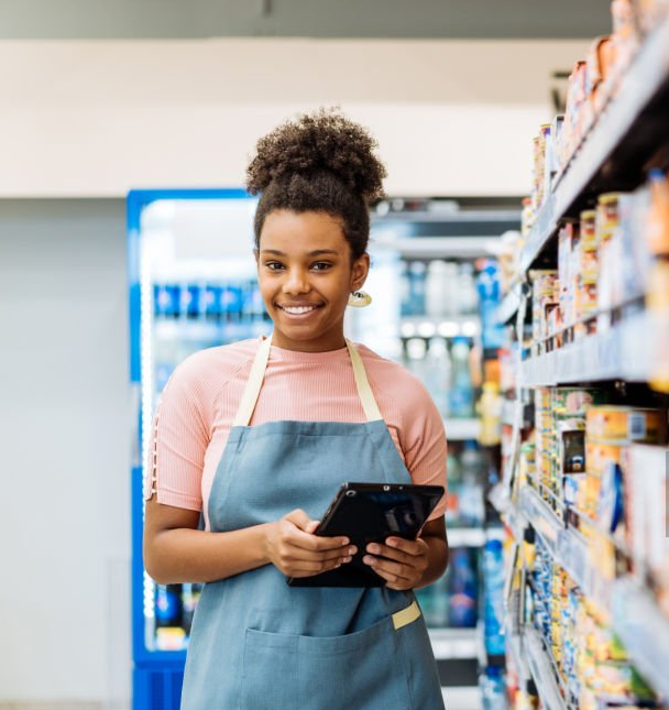 Retail business owner using tablet